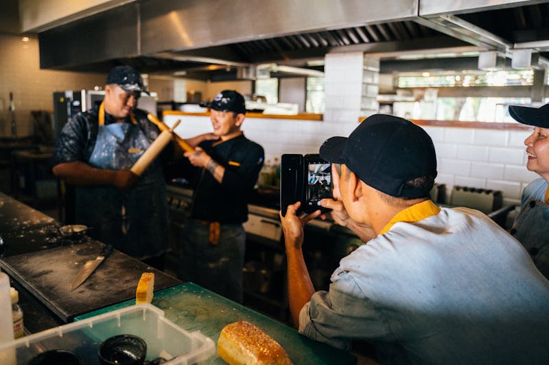 Friendly Mod Pizza staff ready to serve every guest with a smile